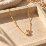 Pearl Loop Ring Station Necklace styled on a display