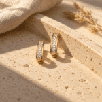 Square Crystal Channel Hoop Earrings styled on a display