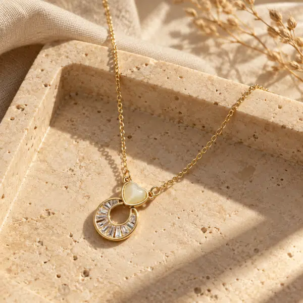 Heart Pearl Ring Necklace styled on a display