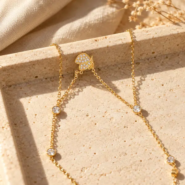 Butterfly Crystal Body Chain Necklace styled on a display