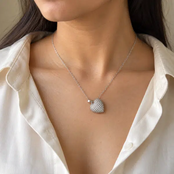 Silver-Tone Pavé Heart Necklace worn by a model