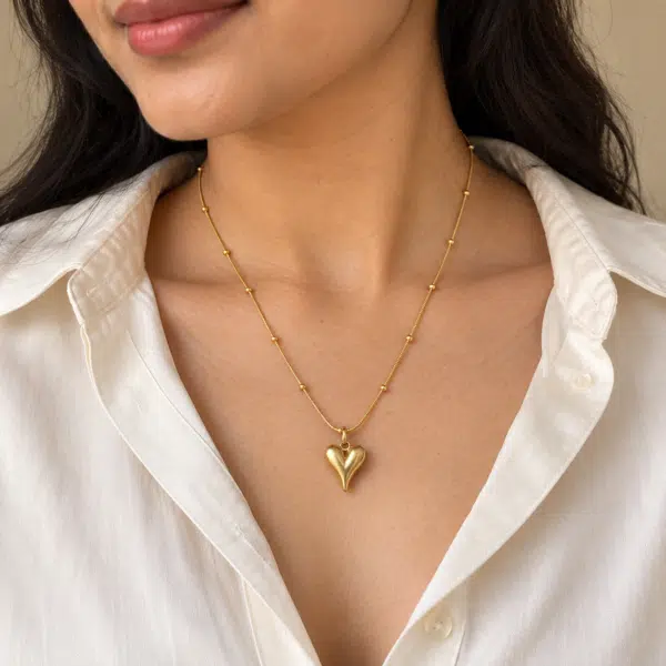 Solid Heart Pendant Necklace worn by a model