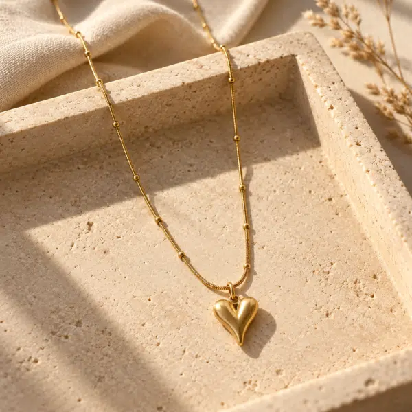 Solid Heart Pendant Necklace styled on a display
