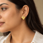 Crossed Ribbon Heart Studs worn by a model