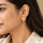 Ribbed Puffed Heart Studs worn by a model