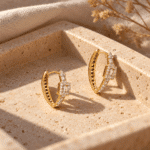 Baguette Crystal Twist Hoops styled on a display