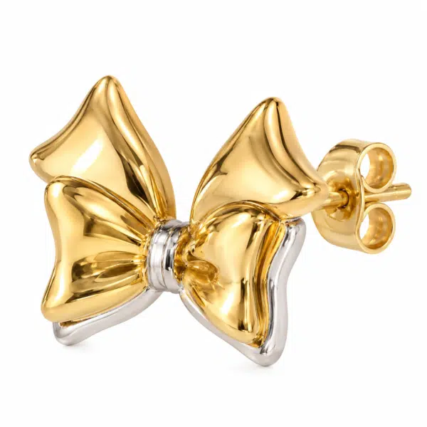 Close-up of a gold plated bow stud earring showing the metal texture