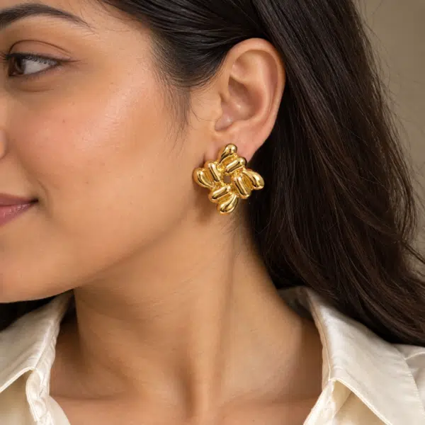Woven Cluster Studs worn by a model