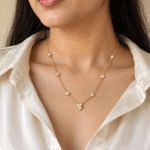 Woman wearing gold plated delicate heart necklace