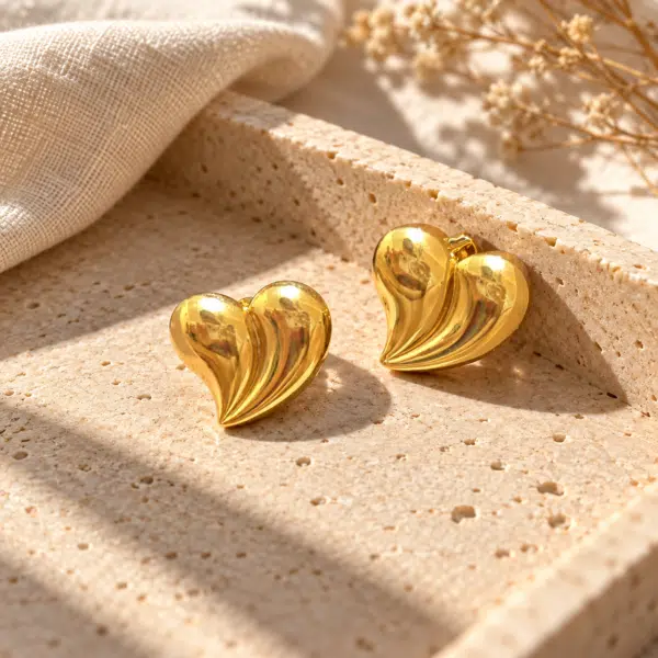 Swirl Heart Studs styled on a display