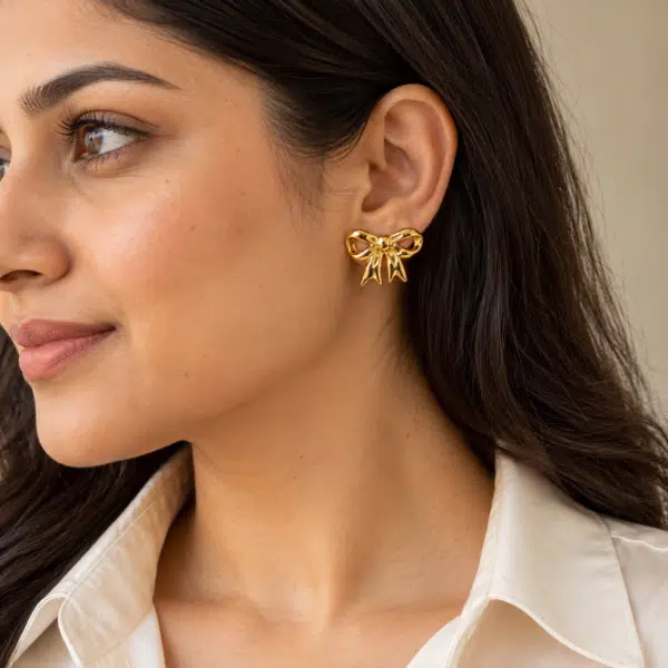 Polished Bow Studs worn by a model