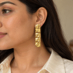 Close up of a model wearing radiant Square Gold Plated Earrings