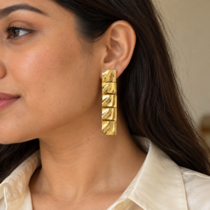 Close up of a model wearing radiant Square Gold Plated Earrings