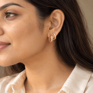 Woman wearing gold Aura Stone Hoop Earrings showcasing style