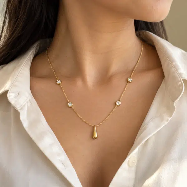 Teardrop Station Necklace worn by a model