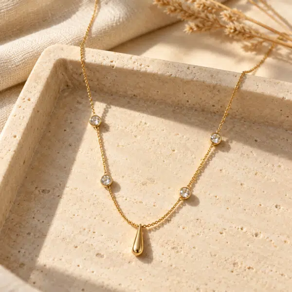 Teardrop Station Necklace styled on a display
