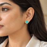 Azure Clover Gold Earrings worn by a model