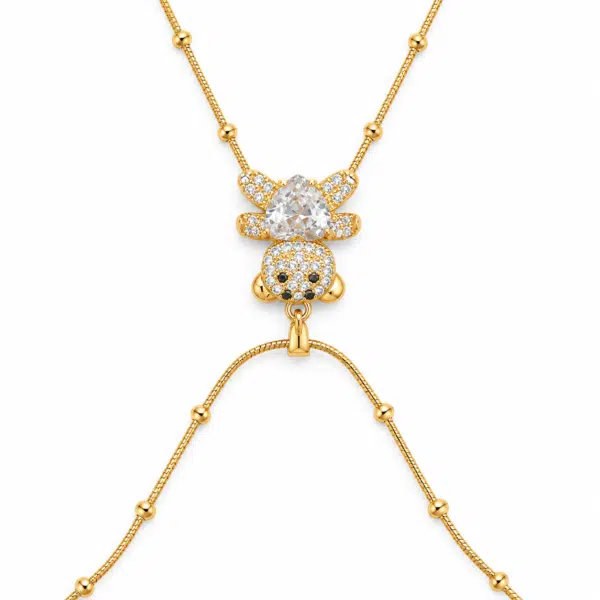 bear cub golden necklace feat Bear Cub Golden Necklace featuring sparkling crystals and a beaded chain