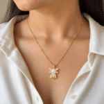 Model wearing a whimsical Bear Cub Golden Necklace