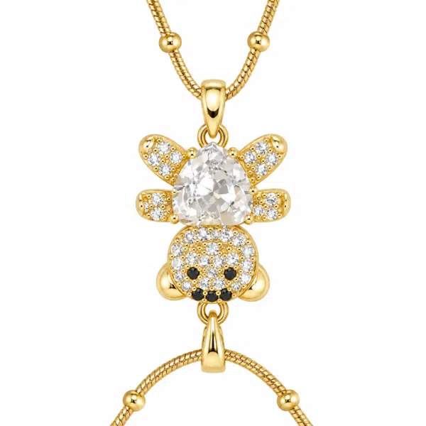 Close up of the sparkling Bear Cub Golden Necklace pendant