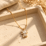 Bear Cub Golden Necklace featuring sparkling crystals and a beaded chain