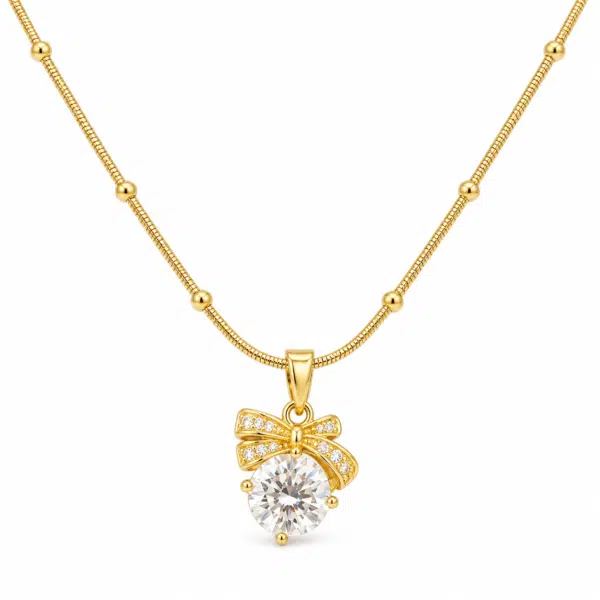 bow solitaire golden necklace feat Bow Solitaire Golden Necklace showing a sparkling central stone with gold ribbon detail