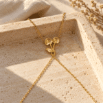 Close-up of gold plated cherry pendant necklace