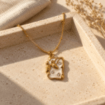 Ethereal Butterfly Gold Necklace styled on a display