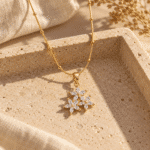 Flora Bloom Pendant Necklace styled on a display