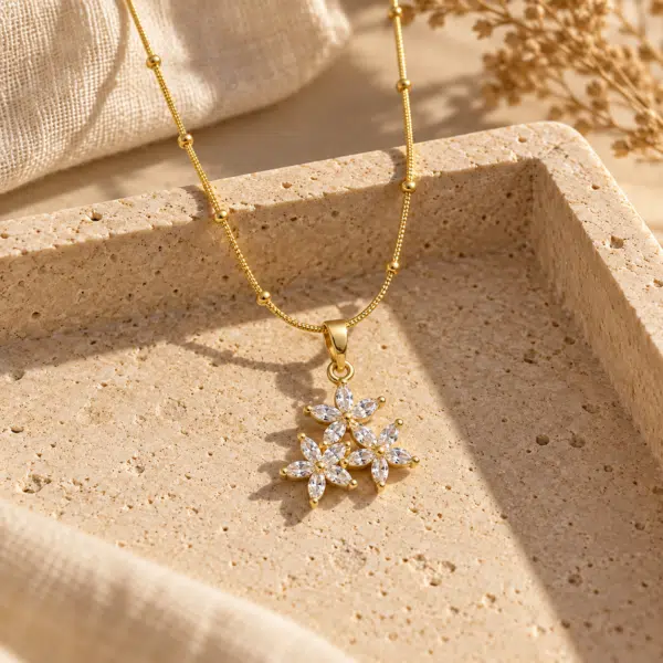 Flora Bloom Pendant Necklace styled on a display