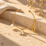 Flora Pearl Charm Kada styled on a display