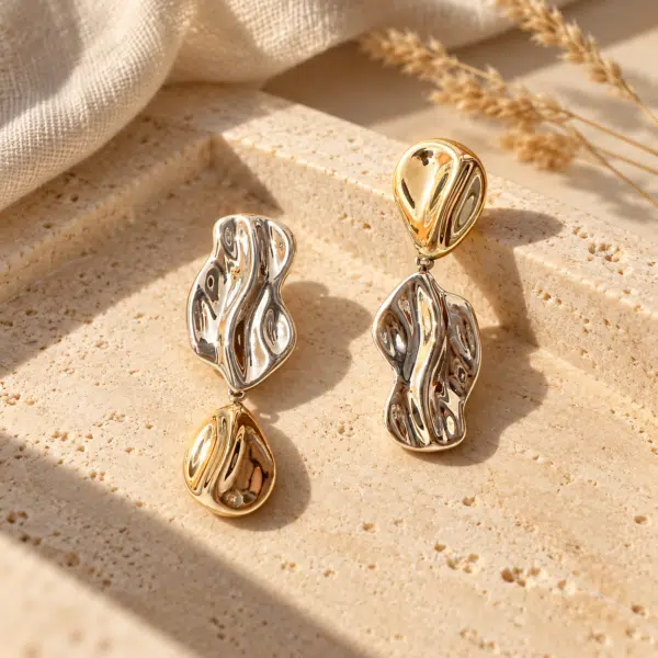 Fluid Melt Drop Earrings styled on a display