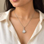 Silver-Tone Fan Pendant Necklace worn by a model