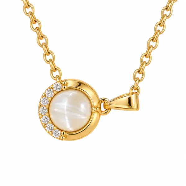 Close up of a gold plated necklace with pearl and crystal detail