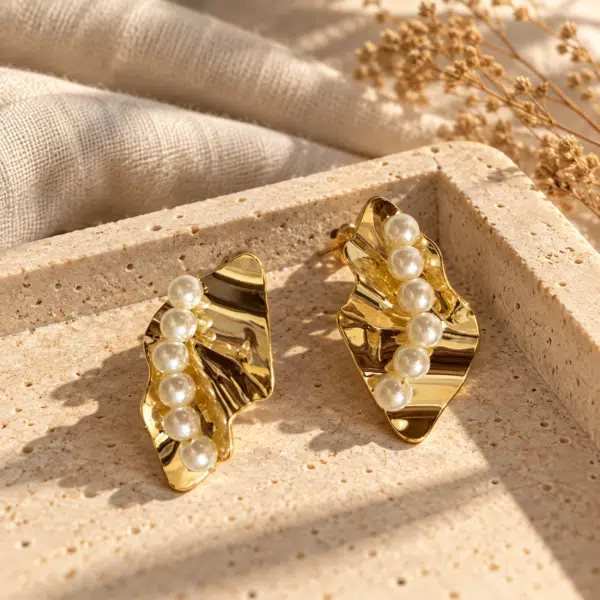 Pair of gold-plated organic-shaped pearl statement earrings