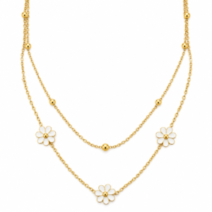 Layered gold necklace featuring white floral petals
