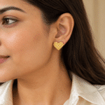 Quilted Heart Studs worn by a model