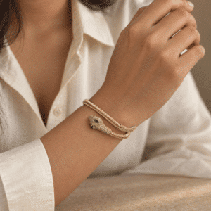 Elegant model wearing the Seraphina gold snake bracelet