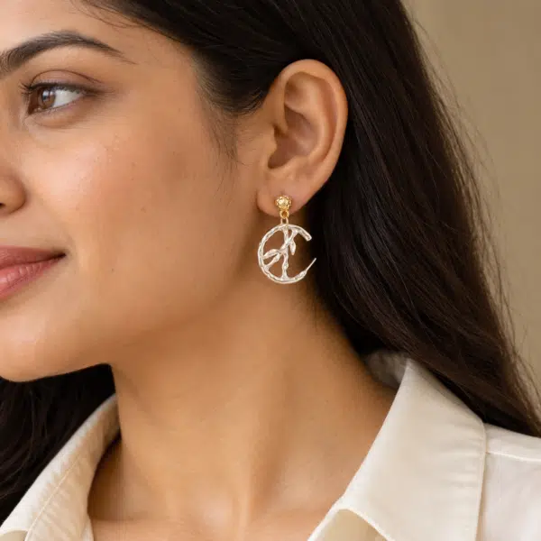 Branch Circle Silver-Tone Drop Earrings worn by a model