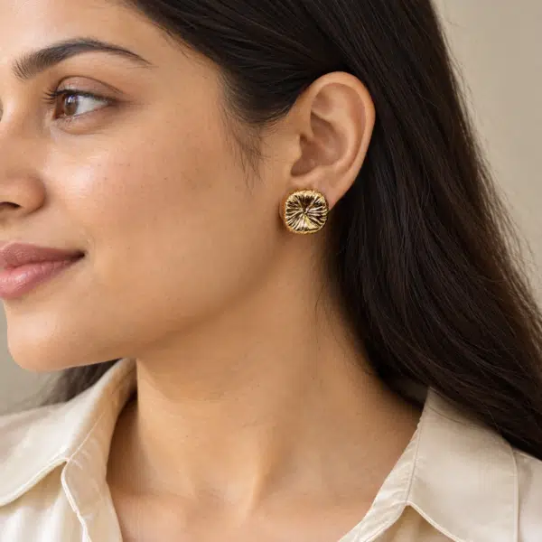 Solaris Gold Studs worn by a model