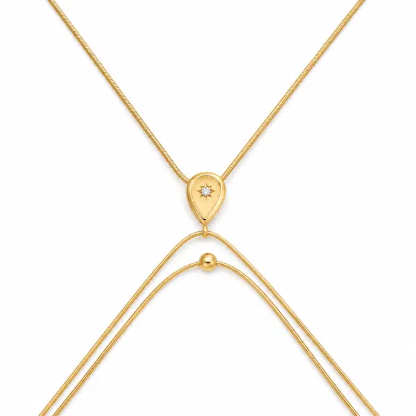 stellar drop body chain feat Gold-plated Stellar Drop Body Chain isolated on white background