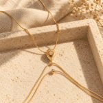 Gold-plated Stellar Drop Body Chain isolated on white background