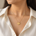 Model wearing a gold plated pendant necklace