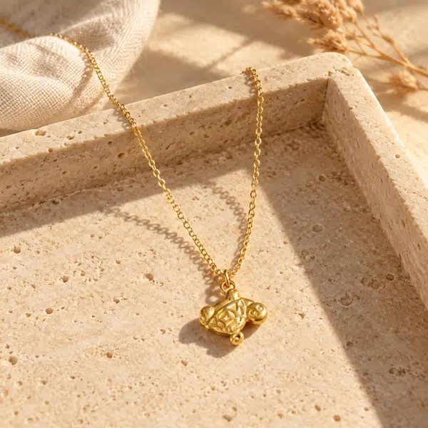 Tortuga gold plated pendant necklace close up