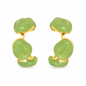 Front view of green resin hoop earrings on white background