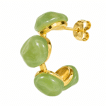 Detailed side profile of green resin hoop earring on white background